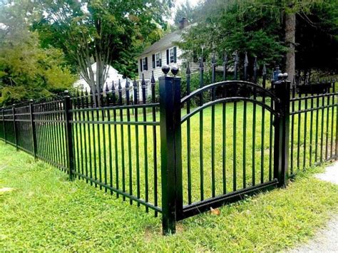 house with metal fence on the side|metal fence styles.